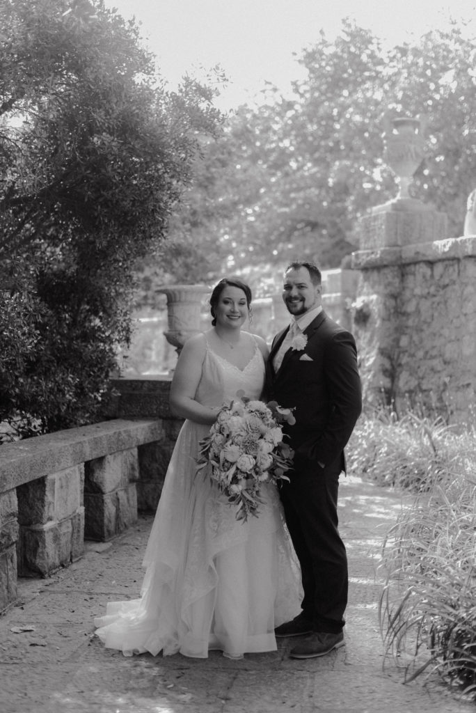 a black and white portrait of a couple on their wedding day in a botanical garden in Maymont a virginia wedding venue
